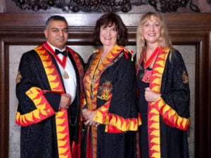 New Master Fueller Chloe Andrews-Jones with Senior Warden Shravan Joshi and Junior Warden Averil Macdonald